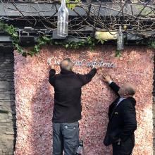 #CourageisConfidence silver mirror on flower wall background